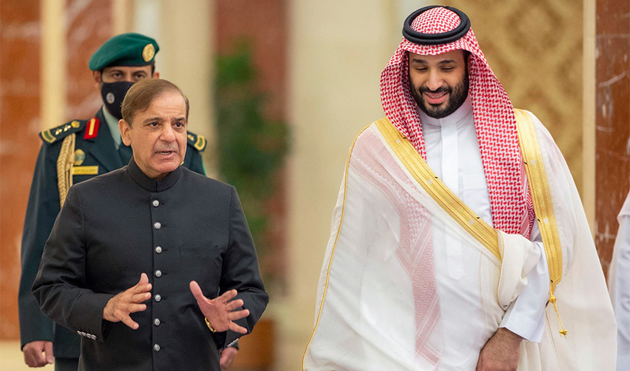 A handout picture provided by the Saudi Royal Palace shows Saudi Arabia's Crown Prince Mohammed Bin Salman (R) welcoming Pakistani Prime Minister Shehbaz Sharif in Jeddah on April 30, 2022. (AFP)