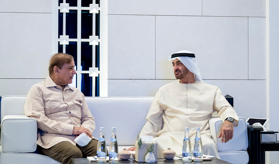 A handout picture released by UAE's Ministry of Presidential Affairs on April 30, 2022, shows Crown Prince of Abu Dhabi Mohamed bin Zayed Al Nahyan (R) meeting with Pakistan Prime Minister Shahbaz Sharif in the Gulf emirate. (AFP)