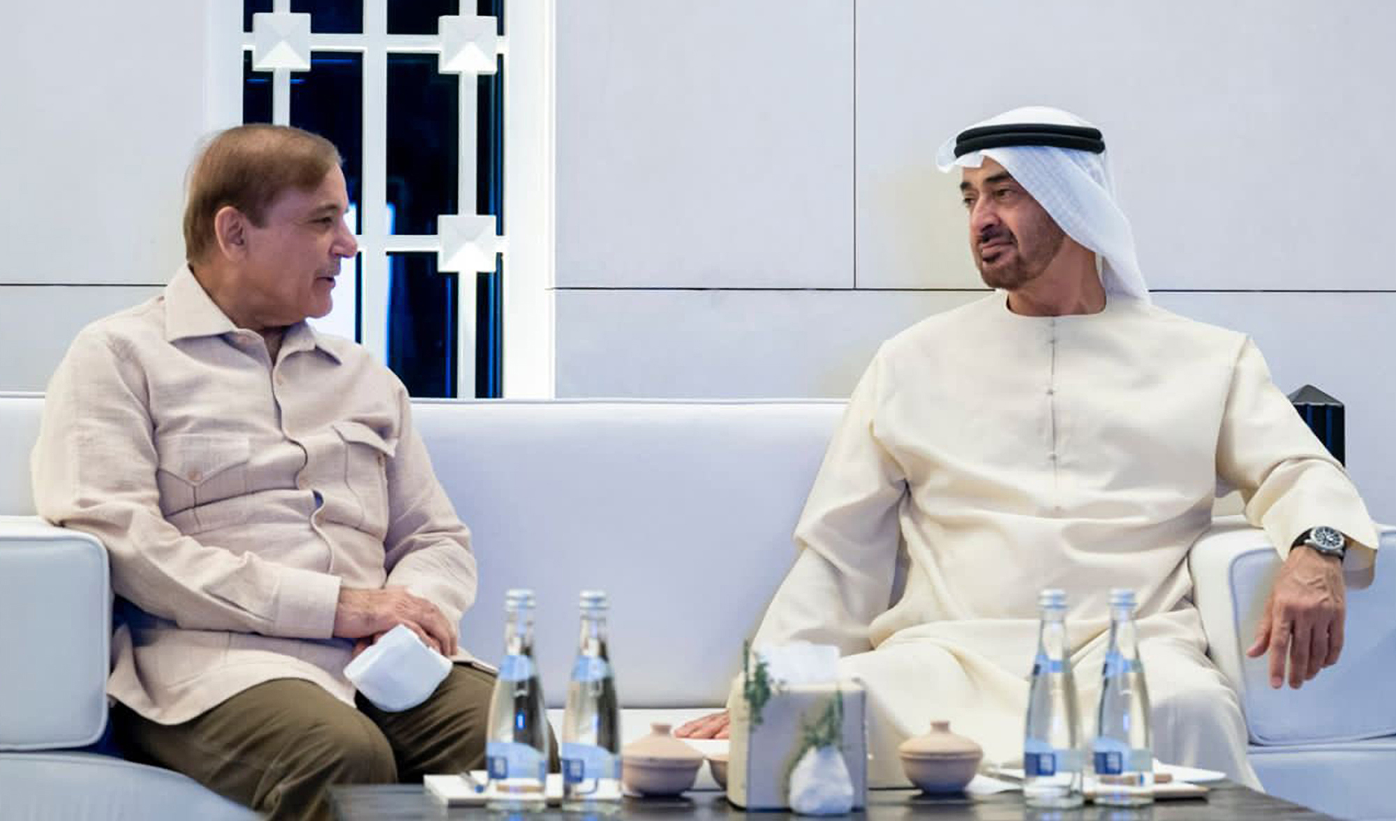 Pakistan Prime Minister Shehbaz Sharif, left, meets Abu Dhabi Crown Prince Mohamed bin Zayed in Abu Dhabi, UAE, on May 1, 2022. (WAM/File)