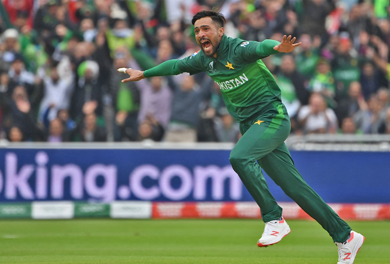 Pakistan's Mohammad Amir celebrates after the dismissal of New Zealand's Martin Guptill during the 2019 Cricket World Cup group stage match at Edgbaston in Birmingham, central England, on June 26, 2019. (AFP/File)