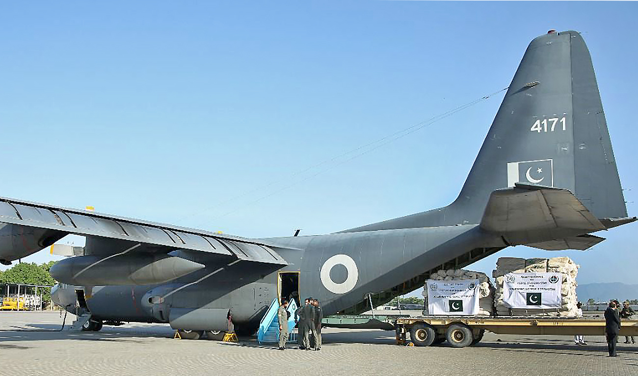 Officials load emergency relief supplies aboard a C-130 aircraft at Nur Khan Air Base in Rawalpindi, Pakistan, on May 7, 2022. (Photo courtesy: APP)