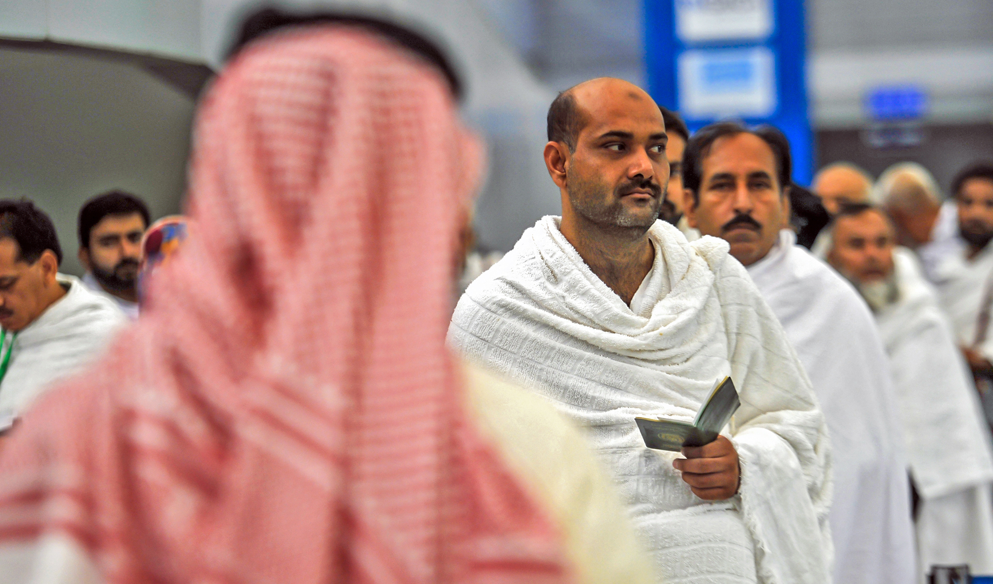 Pakistani Muslims wait to be checked by security as the first pilgrims for the annual Hajj pilgrimage arrive in Jeddah, Saudi Arabia, on July 24, 2017. (AFP/File)