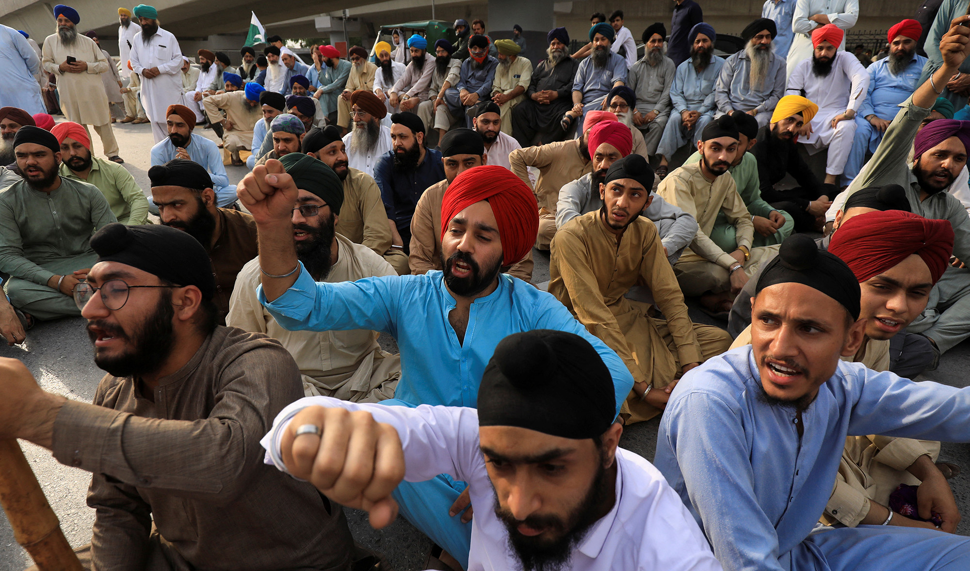 Members of the Pakistan's Sikh community, protest, after, according to police, two Sikh men were killed by gunmen, in Peshawar, Pakistan on May 15, 2022. (REUTERS)