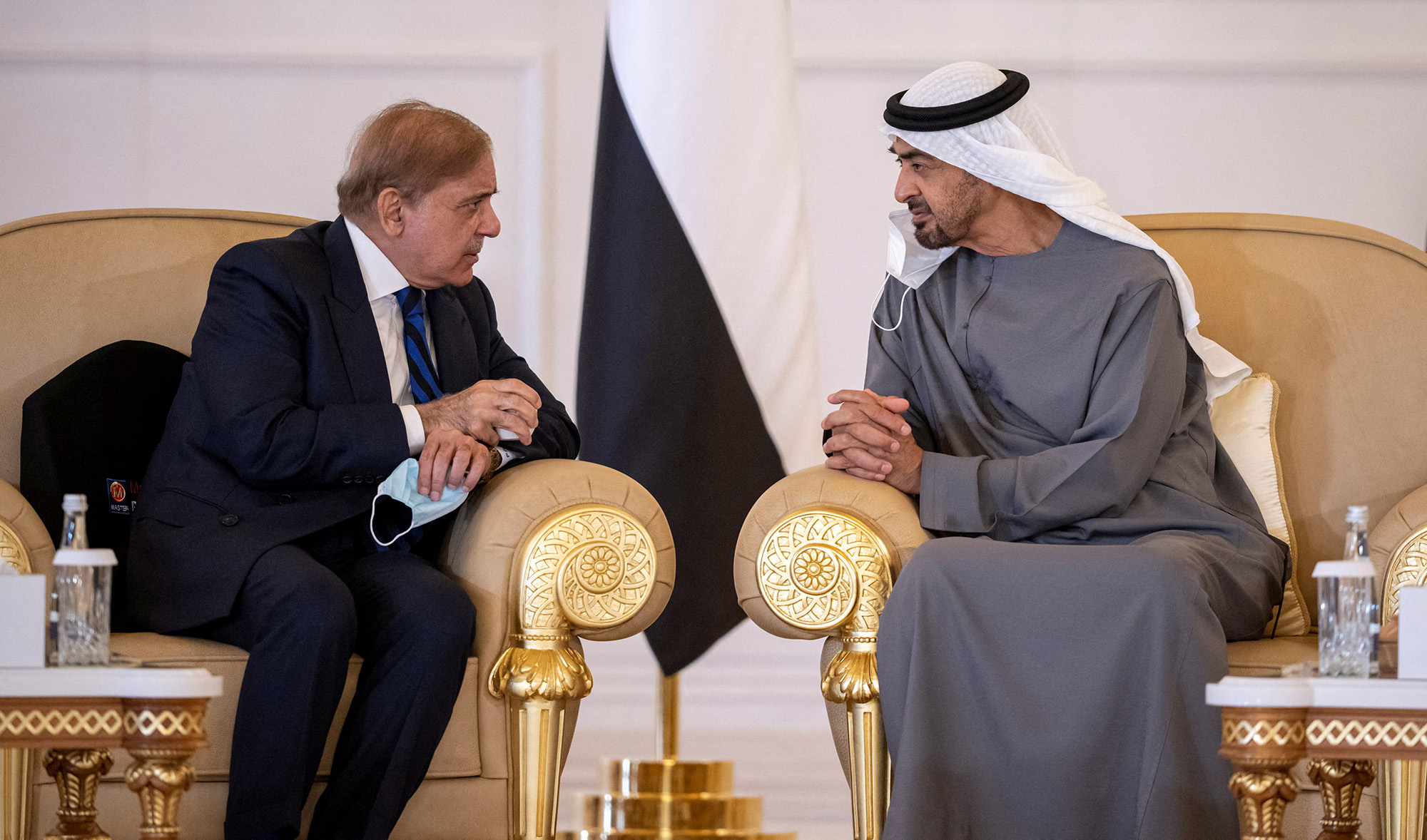 Pakistan's Prime Minister Shehbaz Sharif, left, offers condolences to United Arab Emirates' President Sheikh Mohammed bin Zayed Al Nahyan after the death of president Sheikh Khalifa in Abu Dhabi on May 15, 2022. (UAE Ministry of Presidential Affairs)