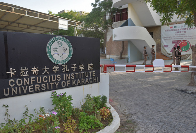 Rangers stand guard nearby the blast site near the Confucius institute at the Karachi University in Karachi, Pakistan, on April 27, 2022. (AFP/File)