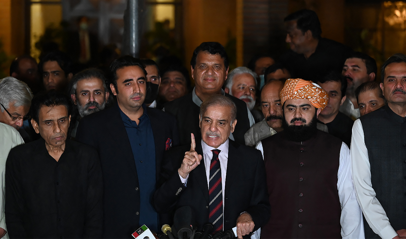 Pakistan's Prime Minister Shahbaz Sharif (C) speaks flanked by Bilawal Bhutto Zardari (3rdL) during a press conference with other parties leaders in Islamabad on April 7, 2022 after a Supreme Court verdict. (AFP/File)