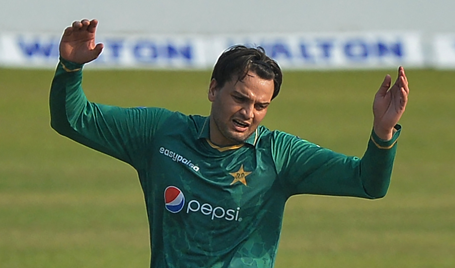 Pakistan's Usman Qadir reacts after a misfield during the third Twenty20 cricket match against Bangladesh in Dhaka on November 22, 2021. (AFP/File)