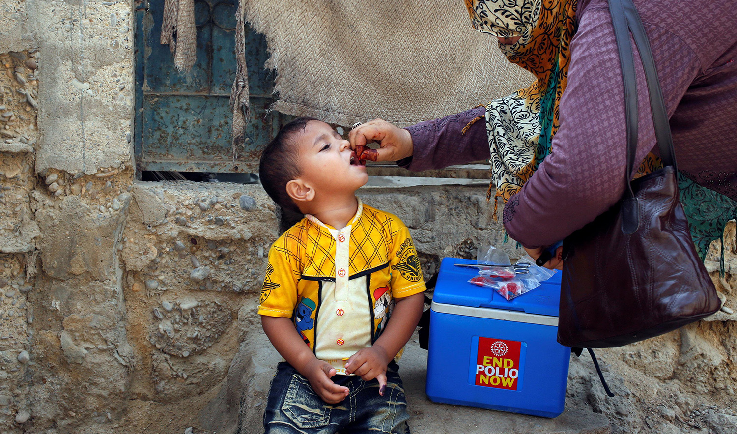 A boy receives polio vaccine drops during an anti-polio campaign in a low-income neighborhood in Karachi, Pakistan, on April 9, 2018. (REUTERS/File)