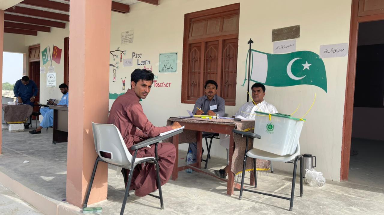 Staff of polling station Pasni, Gwadar Balochistan, Pakistan pose for a photo on May 29, 2022, ( Haroon Shinwari/Spokesman Election Commission of Pakistan)