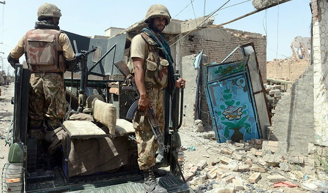 In this file photograph taken on July 9, 2014 shows Pakistani soldiers patrol during a military operation against Taliban militants, in the main town of Miranshah in North Waziristan. (AFP/FILE)