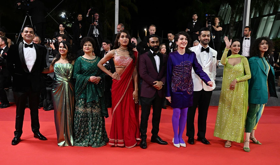 The team of Pakistani film "Joyland" poses for a photo at the 75th edition of the Cannes Film Festival in Cannes, southern France, on May 22, 2022. (AFP)