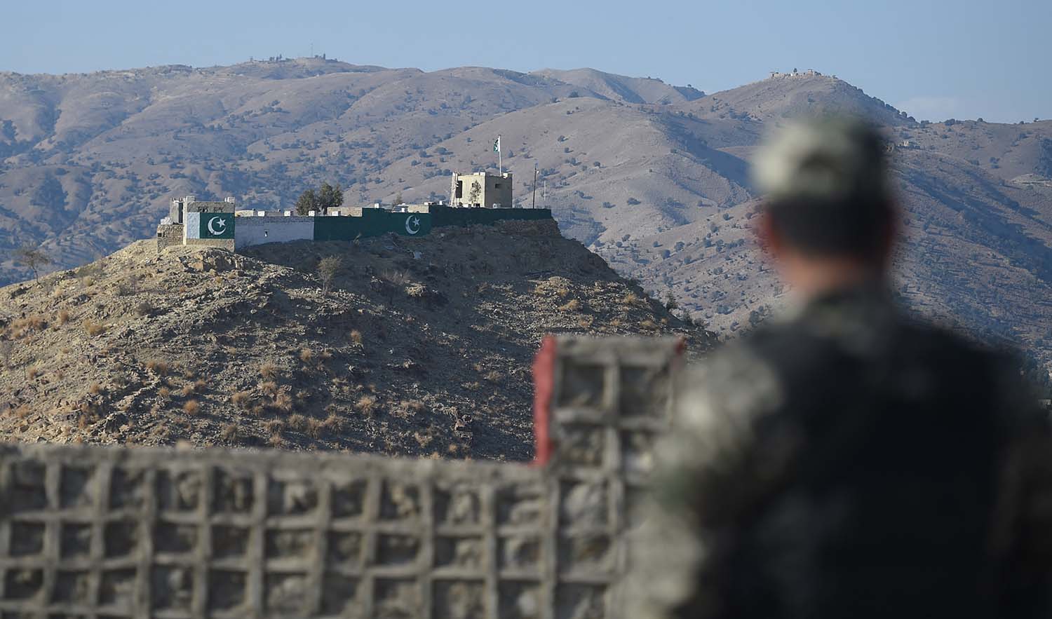 A Pakistani army soldier stands guard on a border terminal in Ghulam Khan, a town in North Waziristan, on the border between Pakistan and Afghanistan, on January 27, 2019. (AFP/File)