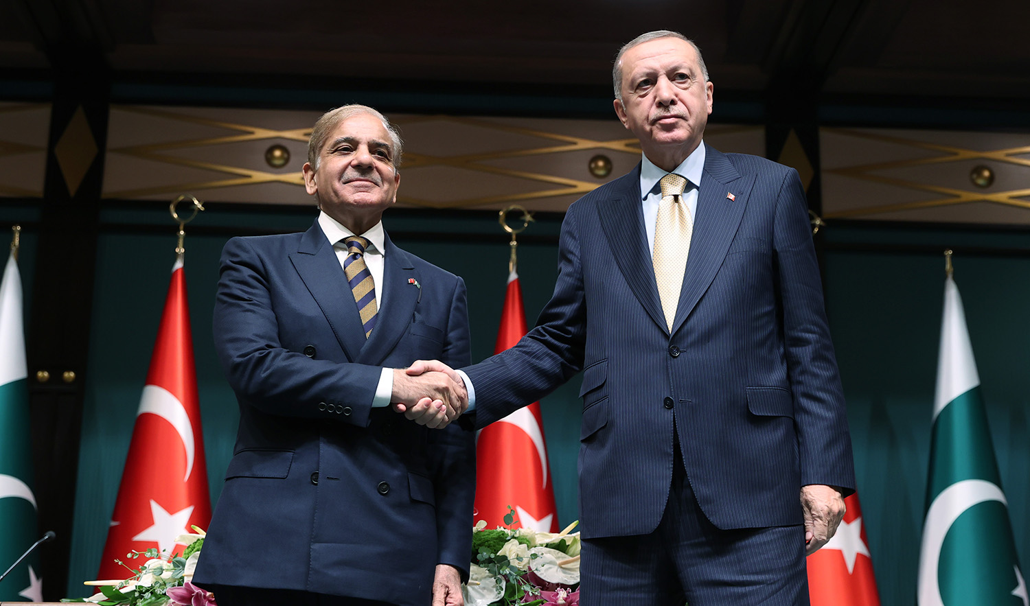 Pakistan Prime Minister Shehbaz Sharif, left, and Turkish President Recep Tayyip Erdogan in Ankara shake hands in Ankara, Turkey, on June 1, 2022. (Photo courtesy: @RTErdogan/Twitter)