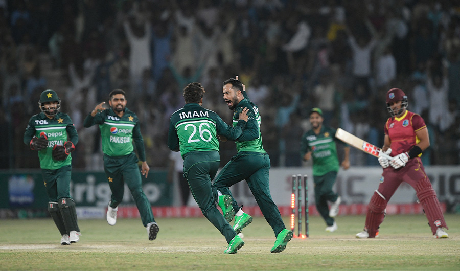 Pakistan's Mohammad Nawaz (C) celebrates with teammates after taking the wicket of West Indies' Brandon King (R) during the second ODI cricket match between Pakistan and West Indies in Multan on June 10, 2022. (AFP)