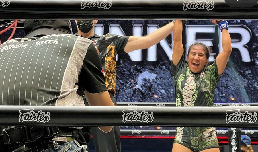Pakistan’s first female mixed martial arts (MMA) specialist Anita Karim celebrates victory against Australian fighter Uyen Ha at Lumpinee Stadium in Bangkok on June 11, 2022. (Social Media)