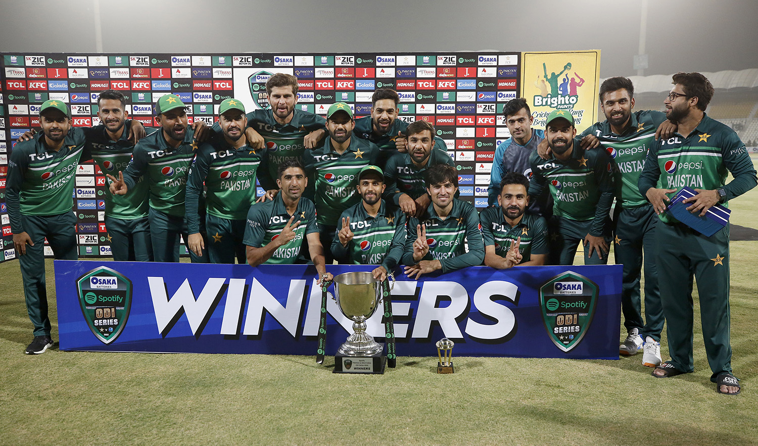 Pakistan cricket team players pose for a photograph with the ODI series trophy during a presentation ceremony at the end of third ODI cricket match against West Indies at the Multan Cricket Stadium in Pakistan, on June 12, 2022. (AP)