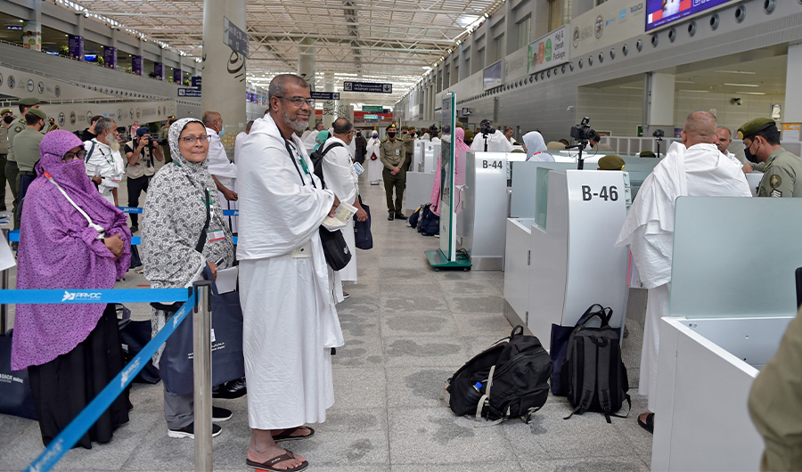 Muslim pilgrims go through passport control upon their arrival at King Abdulaziz International Airport in Saudi Arabia's Red Sea coastal city of Jeddah on June 5, 2022. (AFP)