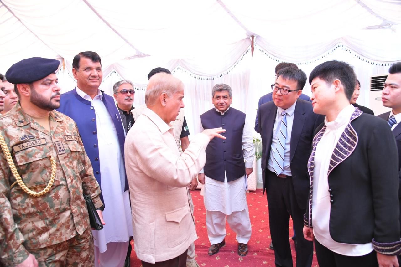Pakistan Prime Minister Shehbaz Sharif speaks to Chinese officials during his visit to the Rashakai special economic zone in Khyber Pakhtunkhwa, Pakistan, on June 15, 2022. (Photo courtesy: @PMLNGovernment/Twitter)