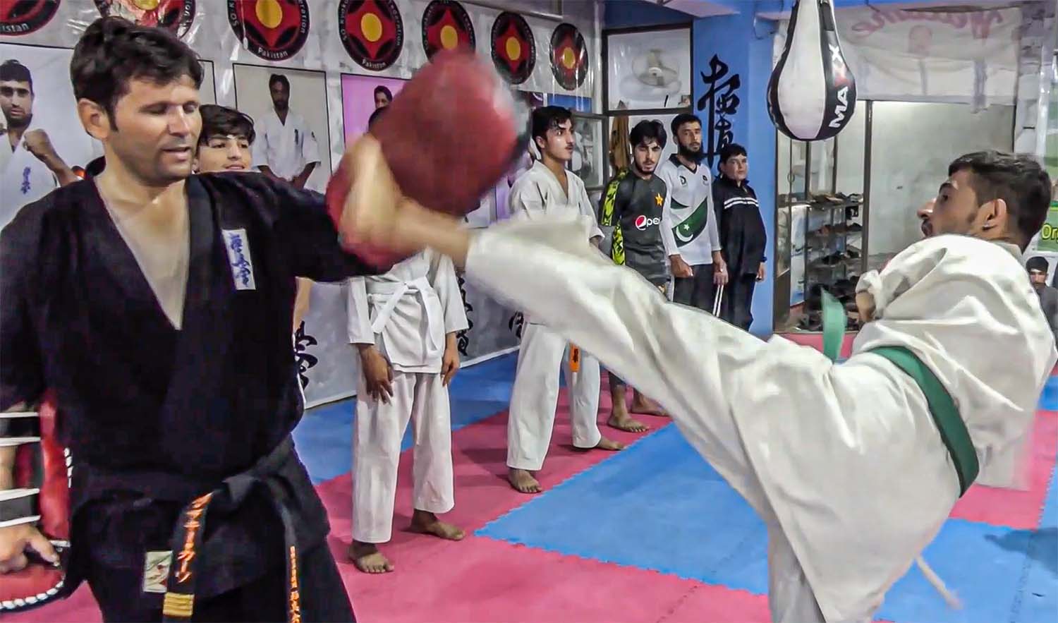 Shoukat Khan, a karate player without arms, can be seen in a training session at a martial arts academy in Quetta, Pakistan, on June 13, 2022. (AN photo)
