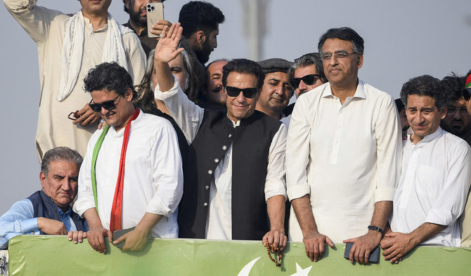 Ousted Pakistan's prime minister Imran Khan (C) waves at his party supporters during a rally in Islamabad on May 26, 2022. (AFP/File)