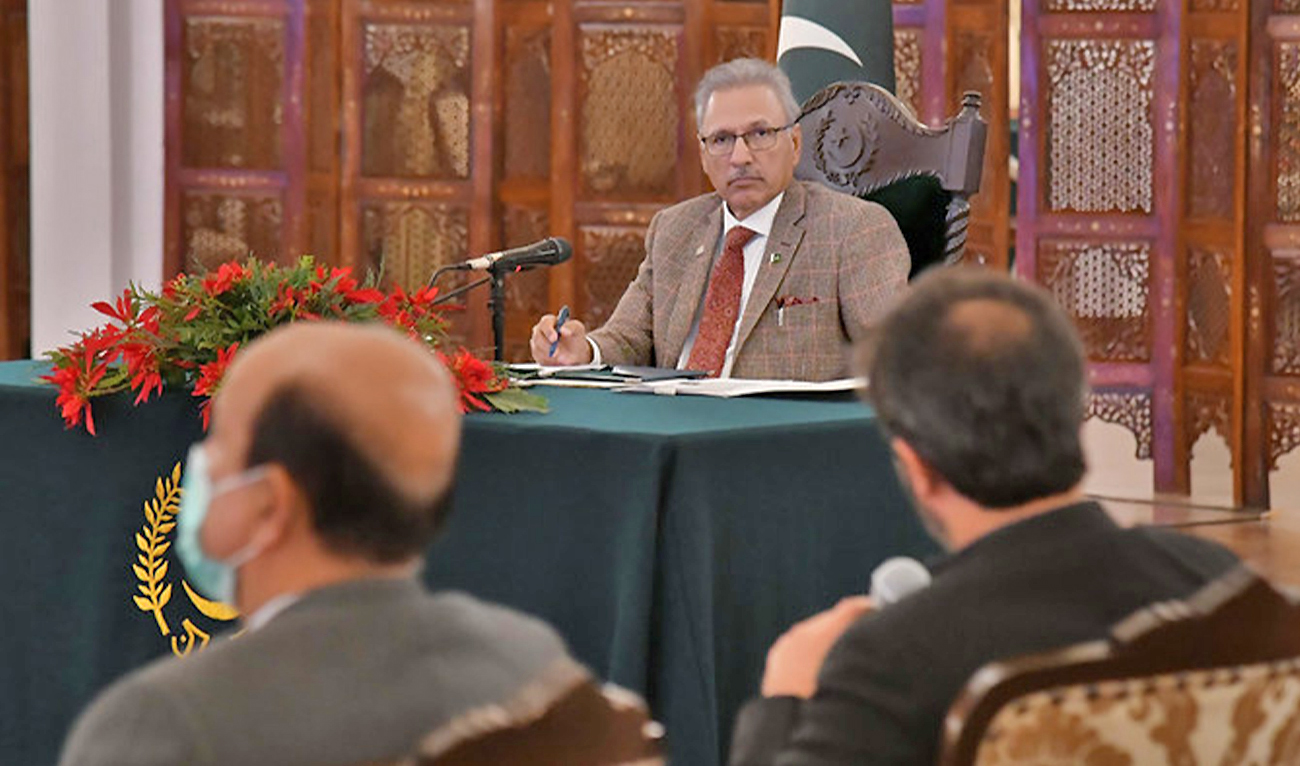 The file photo shows Pakistan President Dr. Arif Alvi chairing a meeting of the National Steering Committee in Islamabad, Pakistan, on February 3. 2021. (@PresOfPakistan/Twitter)