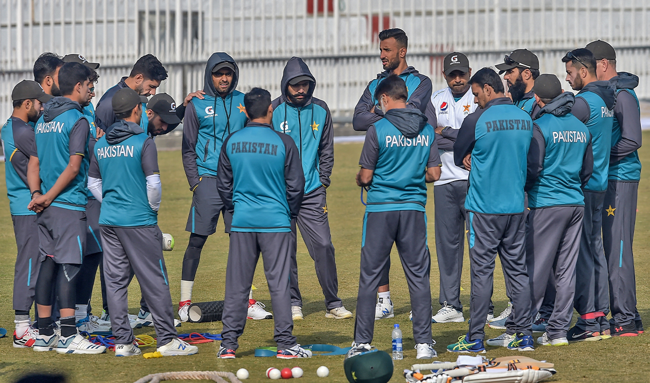 Pakistan's cricketers and officials gather before the team's practice session at the Pindi Cricket Stadium ahead of the first Test cricket match between Pakistan and Sri Lanka in Rawalpindi, Pakistan, on December 10, 2019. (AFP/File)