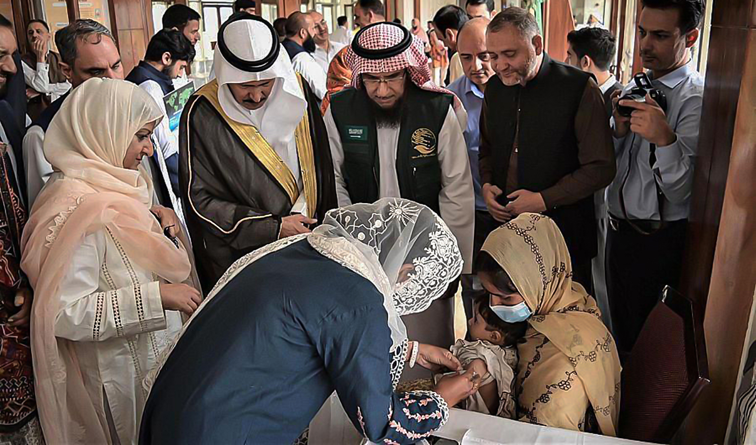 In this photograph captured on June 20, 2022 in Islamabad shows KSrelief and Saudi Embassy officials during the launch of an emergency nutritional support project for malnourished woman and children in Pakistan. (SPA)