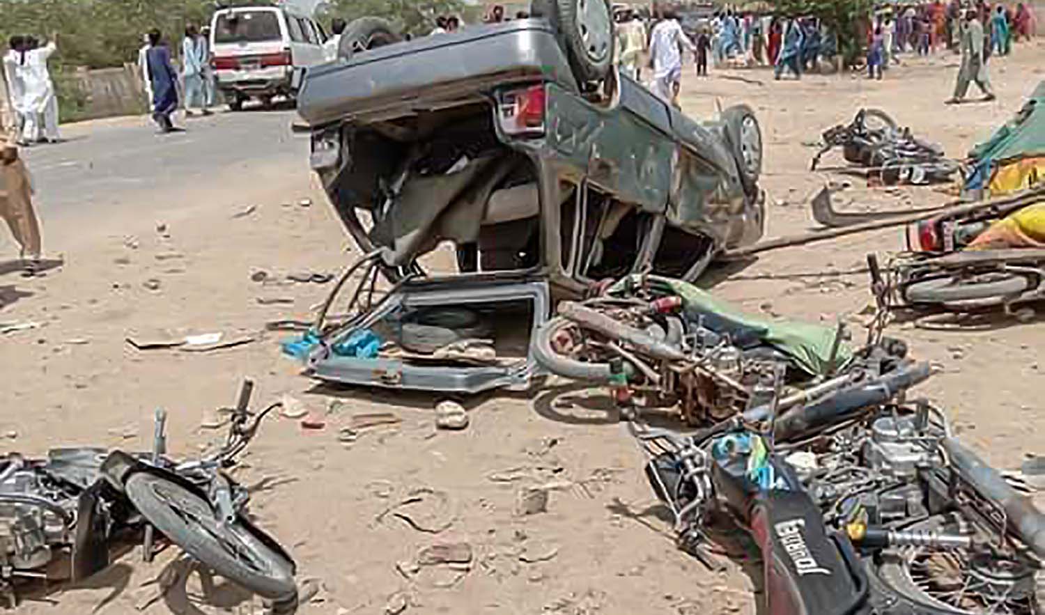 The photograph shows wrecked vehicles as clashes broke out between rival political parties in Karachi, Pakistan, on June 26, 2022. (Photo courtesy: social media)