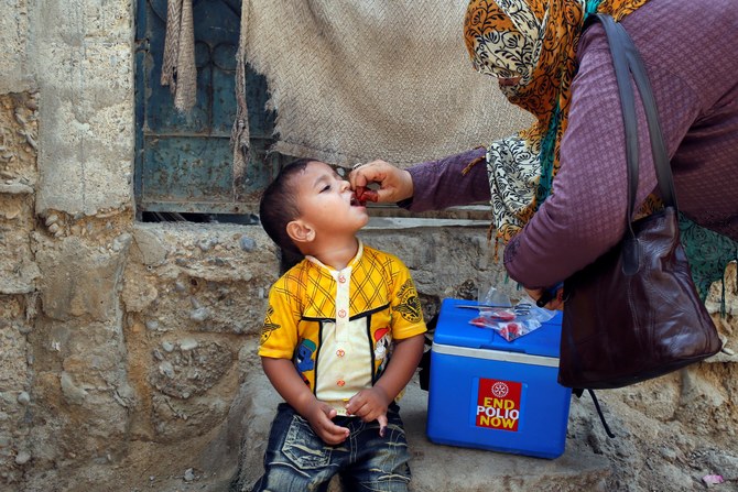 A boy receives polio vaccine drops during an anti-polio campaign in a low-income neighborhood in Karachi, Pakistan, on April 9, 2018. (REUTERS/File)