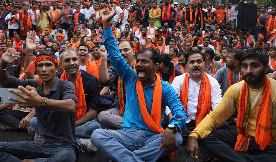 Activists of the right wing Hindu Janajagruti Samithi organisation shout slogans during a protest against the recent killing of Hindu tailor Kanhaiya Lal in Udaipur allegedly by two Muslim men in Bangalore on June 29, 2022. (AFP)