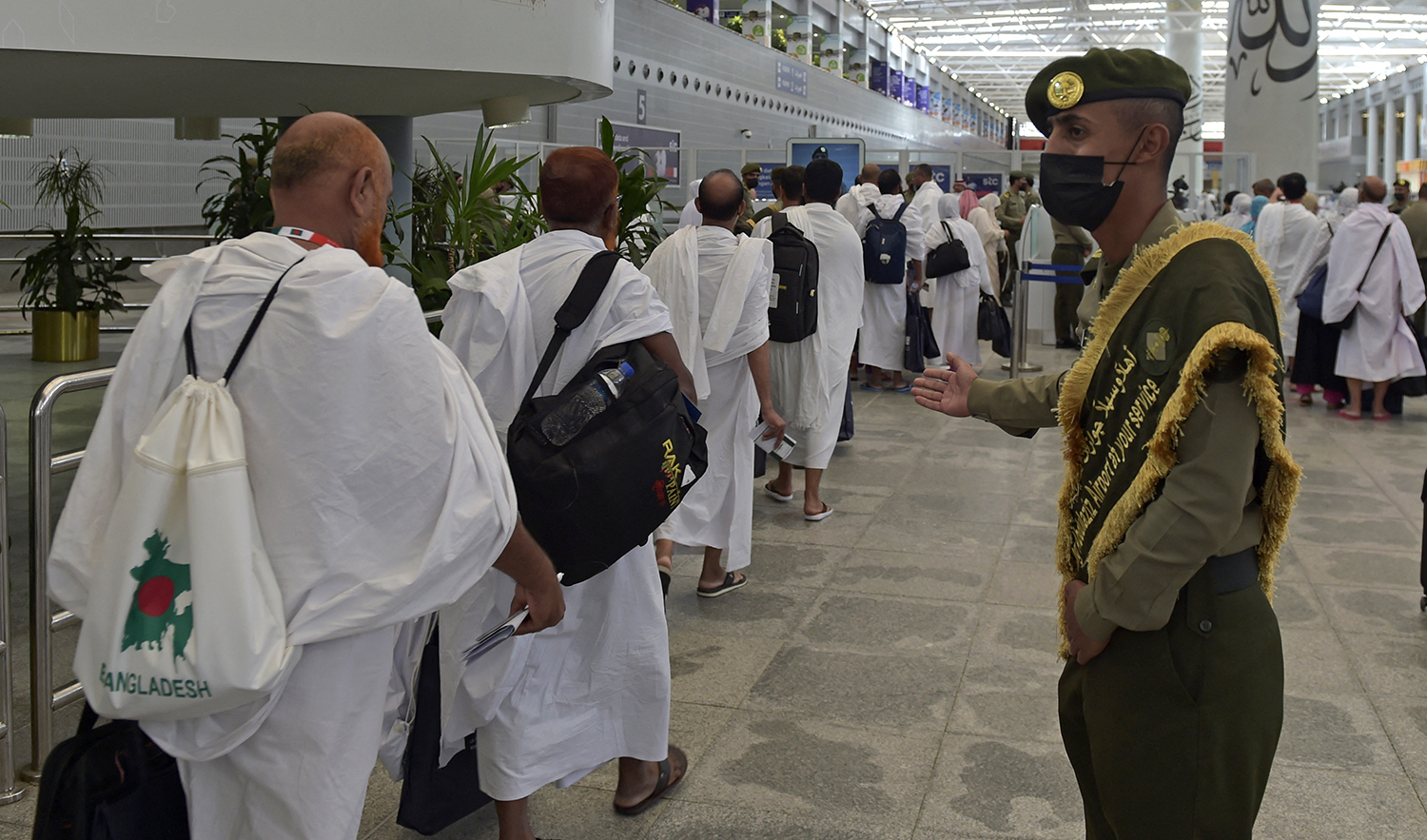 Muslim pilgrims arrive at King Abdulaziz International Airport in Saudi Arabia's Red Sea coastal city of Jeddah on June 5, 2022, prior to the annual Hajj pilgrimage in the holy city of Makkah. (AFP/File)