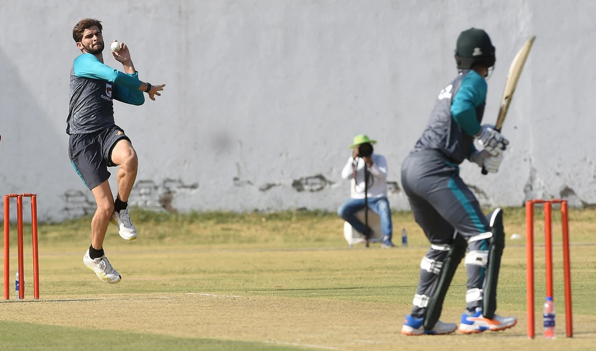 Pakistan's Shaheen Shah Afridi (L) delivers a ball during the practice session in Lahore on June 4, 2022, ahead of the West Indies cricket tour of Pakistan. (AFP)