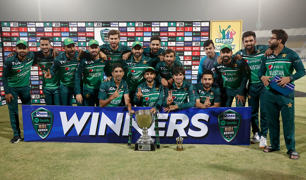 Pakistan cricket team players pose for a photograph with the ODI series trophy during a presentation ceremony at the end of third ODI cricket match against West Indies at the Multan Cricket Stadium in Pakistan, on June 12, 2022. (AP)