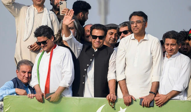 Ousted Pakistan's prime minister Imran Khan (C) waves at his party supporters during a rally in Islamabad on May 26, 2022. (AFP/File)
