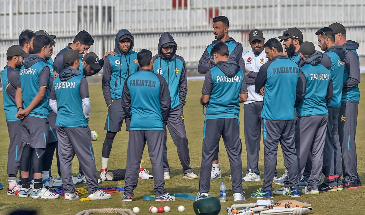Pakistan's cricketers and officials gather before the team's practice session at the Pindi Cricket Stadium ahead of the first Test cricket match between Pakistan and Sri Lanka in Rawalpindi, Pakistan, on December 10, 2019. (AFP/File)