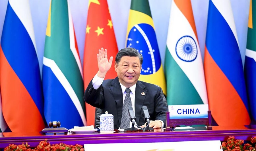 Chinese President Xi Jinping waves while hosting the 14th BRICS Summit in Beijing on June 23, 2022. (@XHNews/Twitter)