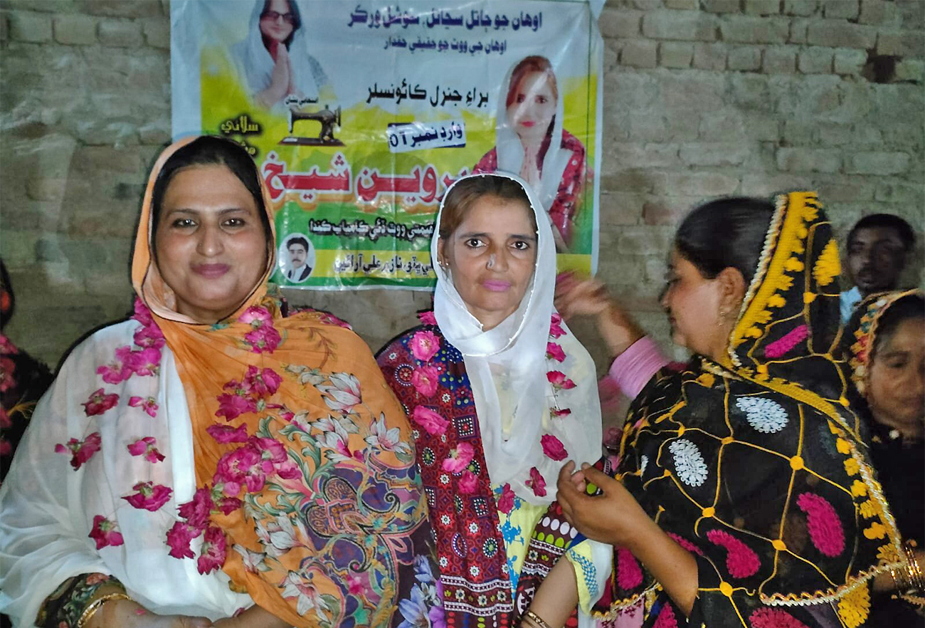 Parveen Sheikh (center) poses for a picture after winning elections from her hometown Saleemabad in southern Pakistan on June 26, 2022. (Parveen Sheikh)