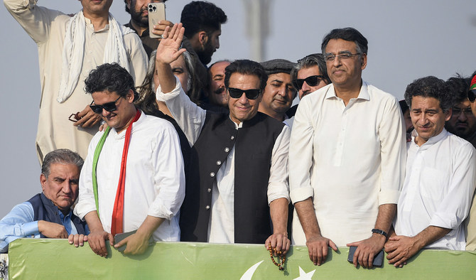 Ousted Pakistan's prime minister Imran Khan (C) waves at his party supporters during a rally in Islamabad on May 26, 2022. (AFP/File)