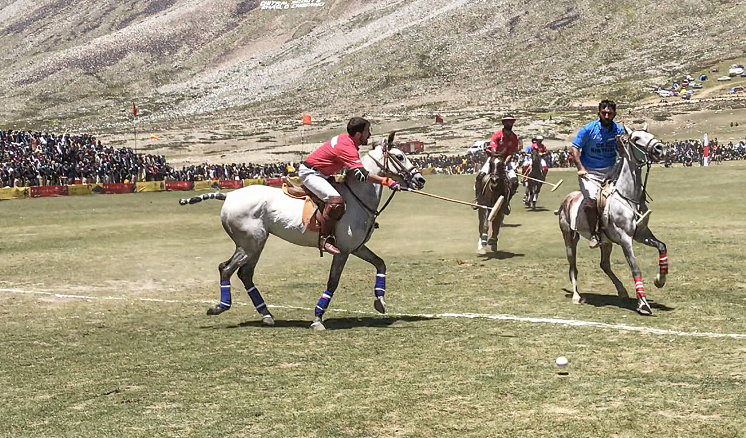 Spectators watch a polo match during Shandur Polo Festival in Shandur, northern Pakistan, on July 2, 2022. (AN photo)