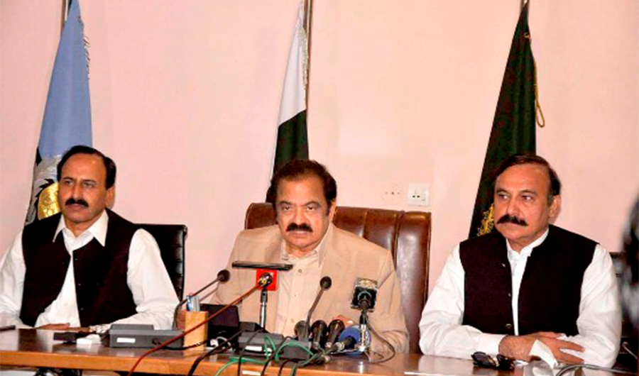 Pakistan's Interior Minister Rana Sanaullah (C) addresses a press conference in Islamabad on July 2, 2022. (APP)