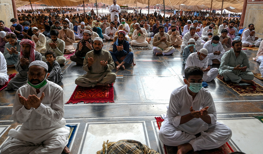 Muslim devotees offer prayers during the Eid al-Adha, the feast of sacrifice, at the Badshahi mosque in Lahore on August 1, 2020. (AFP/FILE)