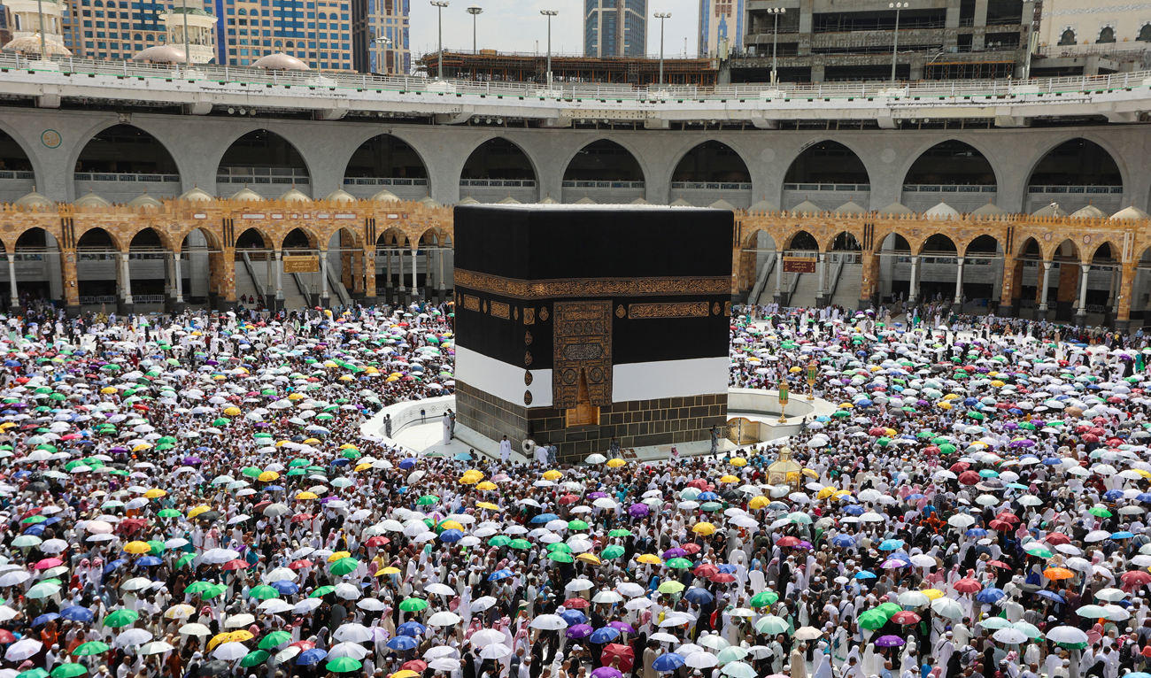 Worshippers perform the farewell tawaf (circumambulation) in the holy Saudi city of Mecca on July 11, 2022, marking the end of this year's Hajj. (AFP)