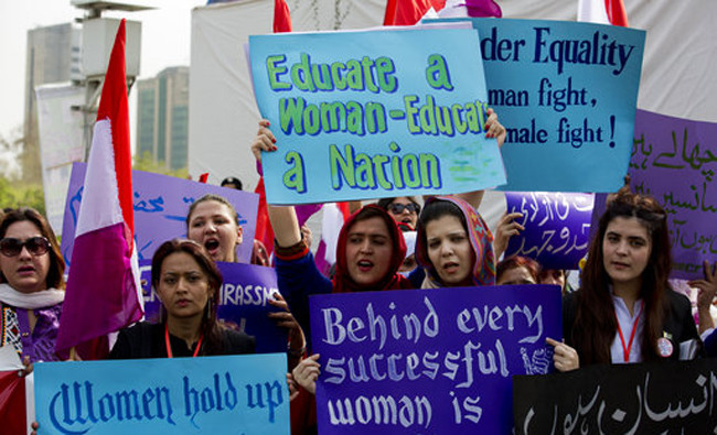 In this file photo, A Pakistani acid attack victim, center, takes part in a rally to mark International Women's Day in Karachi, Pakistan. (AP)