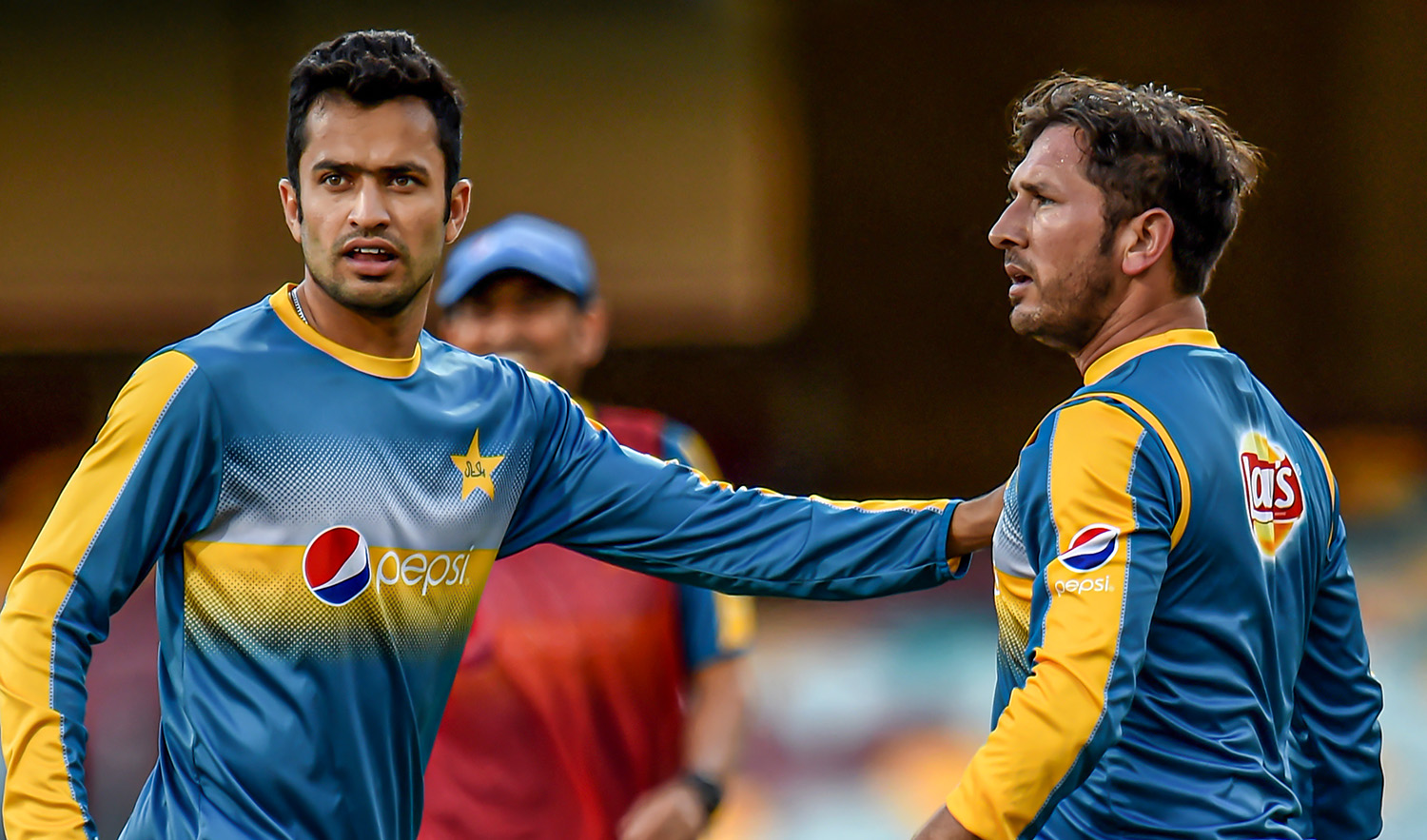 Pakistani players Mohammad Nawaz, left, and Yasir Shah during a football game in the team's training session at Gabba in Brisbane on December 14, 2016, on the eve of a day and night Test against Australia. (AFP/File)