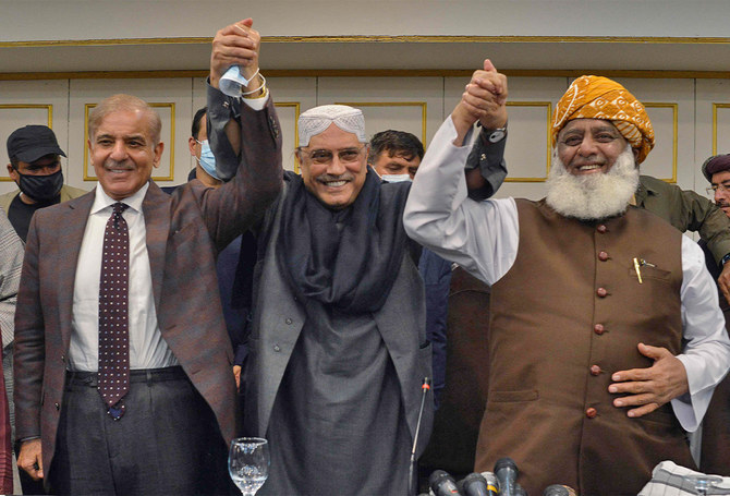 Pakistani opposition leaders, Shahbaz Sharif (L), Asif Ali Zardari (C), former President and leader of Pakistan Peoples Party, and Fazlur Rehman (R), head of JUI-F, gesture during a press conference in Islamabad on March 8, 2022. (AFP)