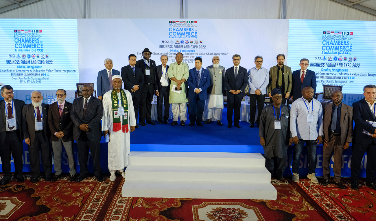 Business leaders and officials from eight developing nations stand for a photograph during the D-8 Chambers of Commerce and Industry Business Forum in Dhaka, Bangladesh, Tuesday, July 26, 2022. (AP)