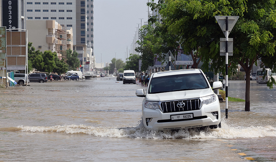 A flooded street is pictured in the UAE's Fujairah emirate following heavy rainfall on July 29, 2022..(AFP)