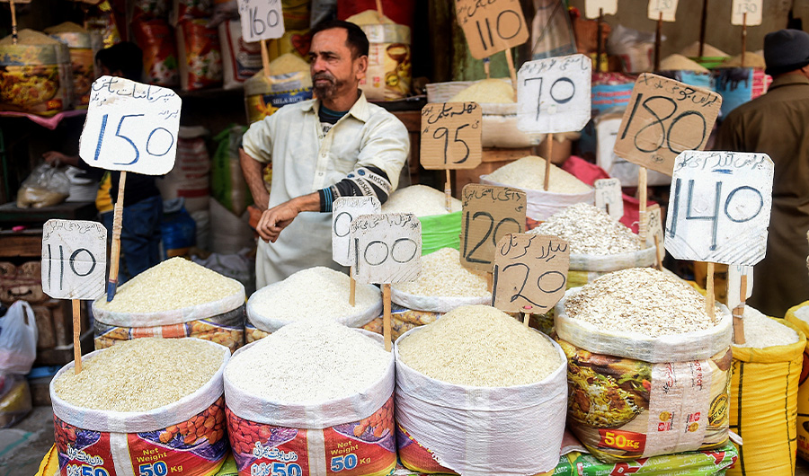 In this picture taken on January 10, 2022, a shopkeeper waits for customers at a market in Karachi. (AFP/FILE)