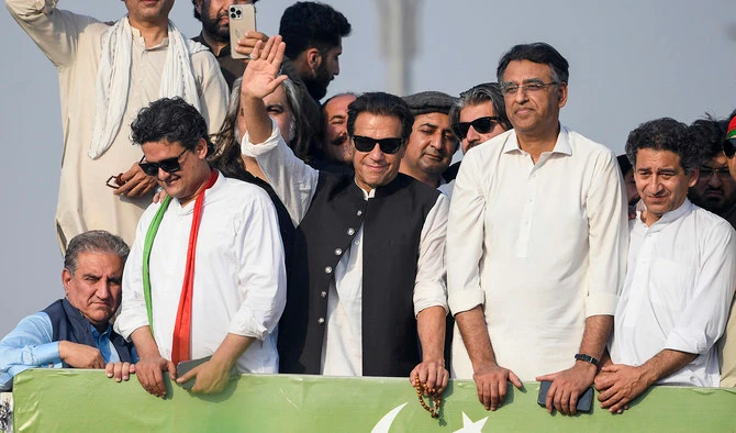 Ousted Pakistan's prime minister Imran Khan (C) waves at his party supporters during a rally in Islamabad on May 26, 2022. (AFP/File)