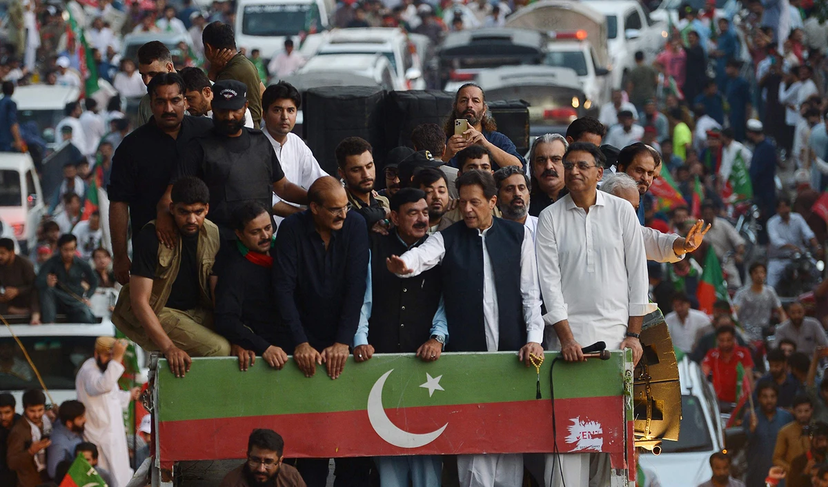 Pakistani former prime minister Imran Khan (front 2R) waves to supporters during an anti-government rally in Rawalpindi on July 2, 2022. (AFP)